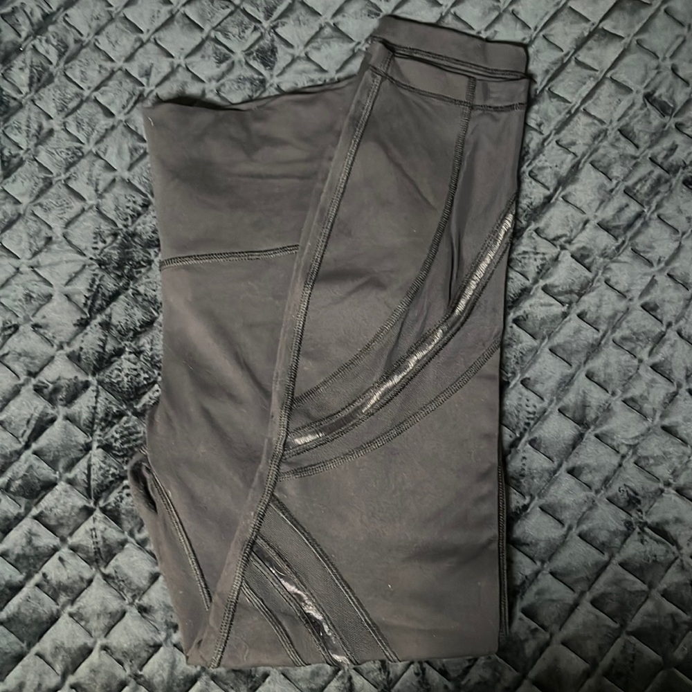 Lululemon Athletica black capri leggings with mesh panels